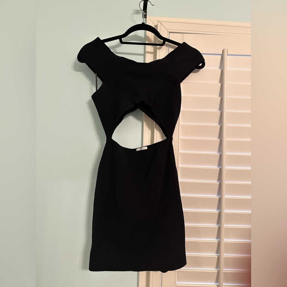 Bodycon little black dress with cut outs